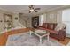 Spacious living room with hardwood floors and stone fireplace provides a cozy and inviting living space at 9001 E Carroll Rd, Winston, GA 30187