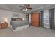 Spacious main bedroom with ceiling fan and decorative details at 9001 E Carroll Rd, Winston, GA 30187
