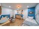 Cozy Bedroom with patterned wallpaper and crib at 110 W Putnam Ferry Rd, Woodstock, GA 30189