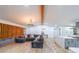 Bright and airy living room with an open layout connecting to the kitchen and dining area at 110 W Putnam Ferry Rd, Woodstock, GA 30189