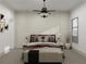 Cozy bedroom features stylish ceiling fan and decorative wall moldings, creating a relaxing ambiance at 1161 Dahlonega Hwy # 9, Cumming, GA 30040