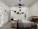Spacious bedroom with contemporary decor, including accent wall art and convenient en-suite access at 1161 Dahlonega Hwy # 9, Cumming, GA 30040