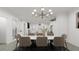 Elegant dining room with stylish lighting and seating for eight, perfect for entertaining at 1161 Dahlonega Hwy # 9, Cumming, GA 30040