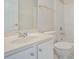 Bright bathroom with a single sink vanity, white cabinets, and a tub and shower combination at 3505 Belridge Ln, Smyrna, GA 30080
