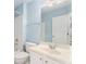 Bright bathroom with a white vanity and tub with shower at 3505 Belridge Ln, Smyrna, GA 30080