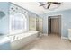 Beautiful bathroom has a large soaking tub, separate shower, and classic fixtures at 3505 Belridge Ln, Smyrna, GA 30080