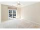 Light-filled bedroom with a large window at 3505 Belridge Ln, Smyrna, GA 30080