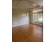 Traditional dining room features hardwood floors, wainscoting, tray ceiling, and decorative chandelier at 3505 Belridge Ln, Smyrna, GA 30080