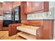 Kitchen features custom cabinetry, granite countertops, and convenient pull-out drawers at 3505 Belridge Ln, Smyrna, GA 30080