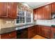 Traditional kitchen featuring cherry cabinets, granite countertops, and stainless steel appliances at 3505 Belridge Ln, Smyrna, GA 30080