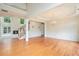 Elegant living room with coffered ceilings, fireplace, and staircase to the second floor at 3505 Belridge Ln, Smyrna, GA 30080