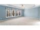 Empty main bedroom has natural light and neutral carpet at 3505 Belridge Ln, Smyrna, GA 30080
