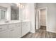 Bathroom with double sink vanity, tile floors, and separate shower at 3658 Madison St, College Park, GA 30337