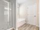 Bathroom featuring a shower and soaking tub at 3658 Madison St, College Park, GA 30337