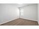 A cozy bedroom with neutral walls and plush carpeting for a comfortable feel at 3658 Madison St, College Park, GA 30337