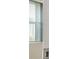 Traditional gas fireplace with a window on one side at 3658 Madison St, College Park, GA 30337