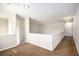 Second floor hallway with carpeting leading to several closed doors at 3658 Madison St, College Park, GA 30337