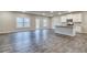 Bright and airy kitchen with stainless steel appliances, island, and hardwood flooring at 4554 Eastbrook Pl, Snellville, GA 30039