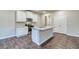 Kitchen featuring stainless steel appliances, granite countertops, and hardwood floors at 4554 Eastbrook Pl, Snellville, GA 30039