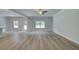 Bright and open living area featuring hardwood floors and a view of the outdoor landscape at 4554 Eastbrook Pl, Snellville, GA 30039