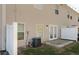 A fenced backyard featuring a patio and an air conditioning unit on the side of the home at 2555 Flat Shoals Road Rd # 1104, College Park, GA 30349
