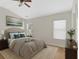 Cozy bedroom with neutral tones, soft lighting, and comfortable bed at 2555 Flat Shoals Road Rd # 1104, College Park, GA 30349