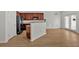 Kitchen with dark cabinets, black appliances, and a breakfast bar overlooking the dining area at 2555 Flat Shoals Road Rd # 1104, College Park, GA 30349