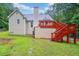 View of backyard with deck and stairway at 4544 Dorsett Shoals Run, Douglasville, GA 30135