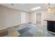 Finished basement with unique carpeting, bar, and walkout access at 4544 Dorsett Shoals Run, Douglasville, GA 30135