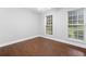 Bright bedroom featuring two windows allowing lots of natural light at 4544 Dorsett Shoals Run, Douglasville, GA 30135