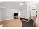 Inviting living room with hardwood floors, neutral colors, and ample natural light at 4544 Dorsett Shoals Run, Douglasville, GA 30135