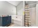 Bright bathroom featuring a soaking tub and shower at 752 Wood Bend Ct, Riverdale, GA 30296