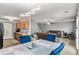 Open floor plan kitchen, dining, and living space featuring modern lighting and furnishings at 752 Wood Bend Ct, Riverdale, GA 30296
