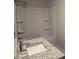Bathroom features a white sink with stainless faucet, a toilet, and a shower/tub combo at 1669 Fuma Leaf Way, Mcdonough, GA 30253