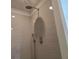 Modern shower featuring sleek gray subway tile and stylish fixtures at 1669 Fuma Leaf Way, Mcdonough, GA 30253