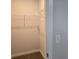Neat walk-in closet with wire shelving, offering practical storage solutions at 1669 Fuma Leaf Way, Mcdonough, GA 30253