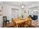 Bright dining room showcases a wood table, seating for four and access to the cozy living room at 1771 Defoor Nw Ave # D, Atlanta, GA 30318