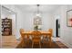 Bright dining room with hardwood floors, traditional decor, and ample seating space at 1771 Defoor Nw Ave # D, Atlanta, GA 30318