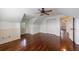Bedroom with hardwood floors, white trim, a ceiling fan and a large closet at 2668 Jefferson Ter, East Point, GA 30344