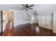 Upstairs bonus room featuring hardwood floors, wainscoting and a double door closet at 2668 Jefferson Ter, East Point, GA 30344