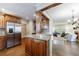 Open kitchen layout with stainless steel appliances and a view to the living room at 2668 Jefferson Ter, East Point, GA 30344