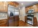 Modern kitchen with stainless steel appliances, custom cabinetry and granite counters at 2668 Jefferson Ter, East Point, GA 30344