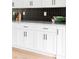 Stylish white kitchen cabinets with modern hardware and elegant countertop space at 2873 Bob White Sw Dr, Atlanta, GA 30311