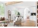 Bright living space featuring a dining area, open kitchen, and comfortable seating with natural light at 2873 Bob White Sw Dr, Atlanta, GA 30311