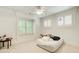 Bedroom with large windows and window seating, neutral carpet and white trim at 42 Greenland Trce, Atlanta, GA 30342