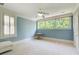 Spacious bedroom with natural light from large windows and plush carpeting at 42 Greenland Trce, Atlanta, GA 30342