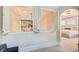 Upstairs hallway with clear view into bedroom, and secondary shuttered window into the stairwell at 42 Greenland Trce, Atlanta, GA 30342