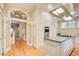 Modern kitchen features stainless steel appliances, an island cooktop, and a breakfast nook nearby at 42 Greenland Trce, Atlanta, GA 30342