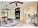 Stylish living area with a fireplace, TV, and view into the kitchen, perfect for entertaining at 42 Greenland Trce, Atlanta, GA 30342
