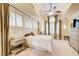 Serene main bedroom with tray ceilings, shutters and soft natural light at 42 Greenland Trce, Atlanta, GA 30342